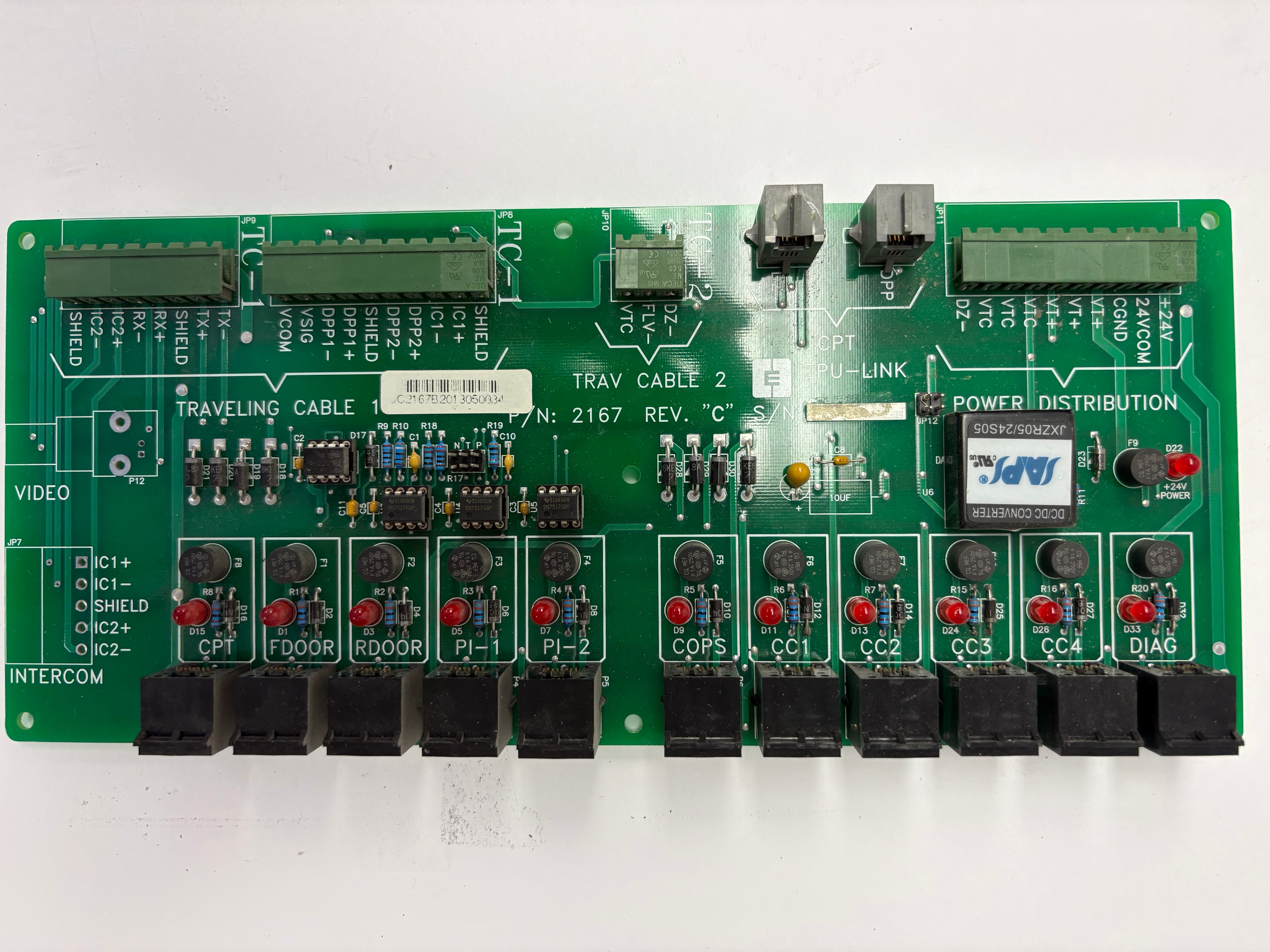CEC P/N 2167 Rev C car top traveling cable distribution board — SAPS DC/DC converter, relay array, DIAG, CC1–CC4, COPS, PI-1/PI-2, RDOOR, FDOOR, CPT, INTERCOM, VIDEO terminals