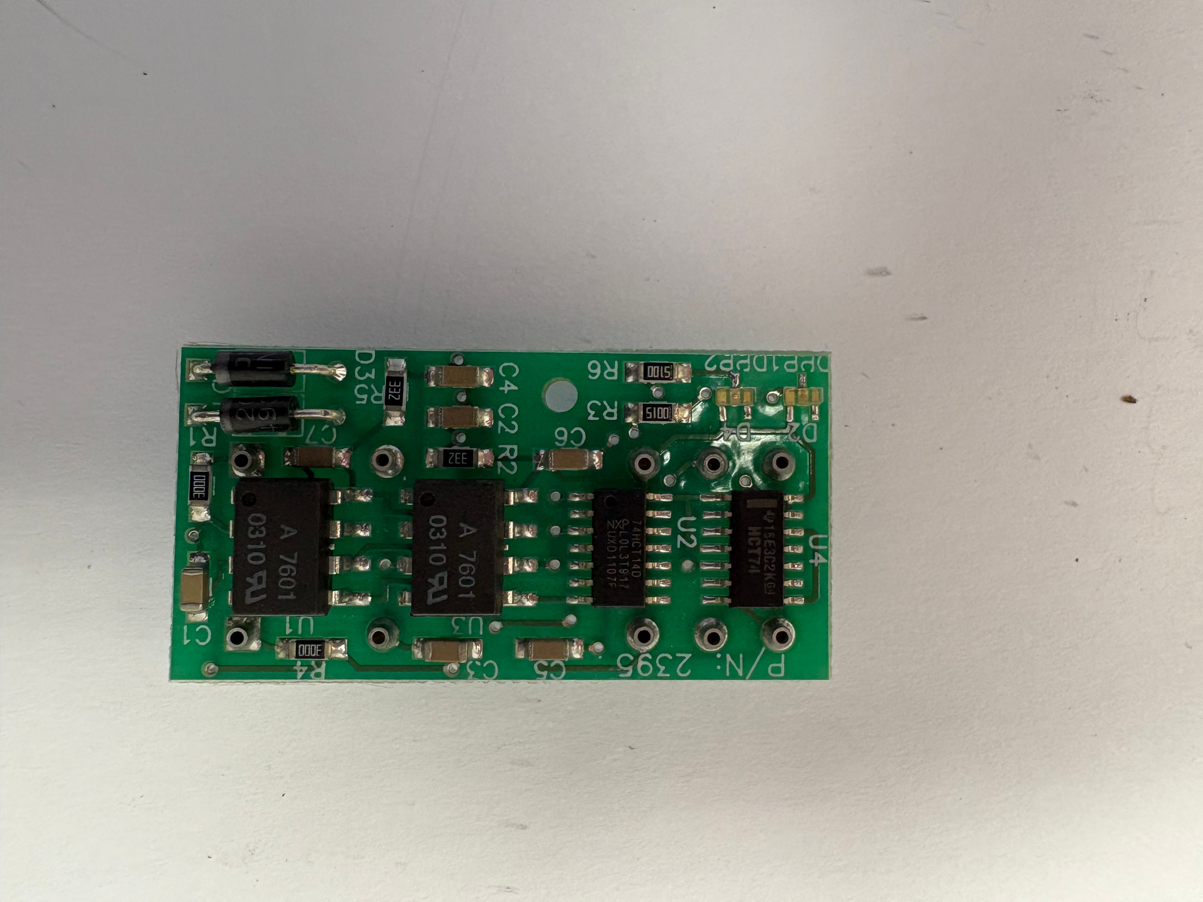 CEC P/N 2395 green elevator logic board — ICs: 74HCT74, 74HCT14D, A7601 ×2, HCT7A, SMD components
