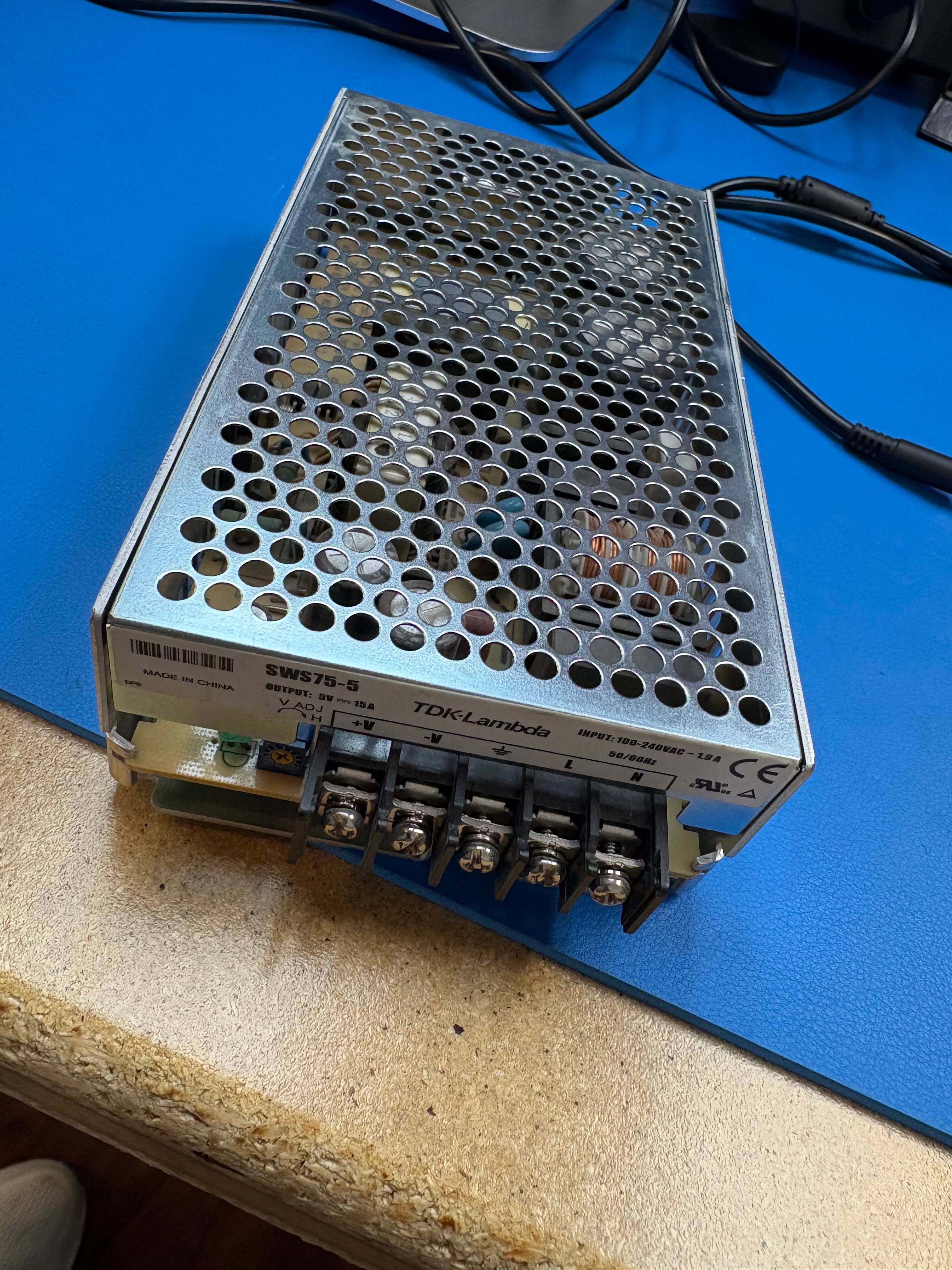 TDK-Lambda SWS75-5 enclosed AC/DC power supply — 5VDC 15A 75W, terminal side view